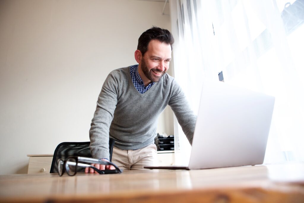 Man looking at a laptop