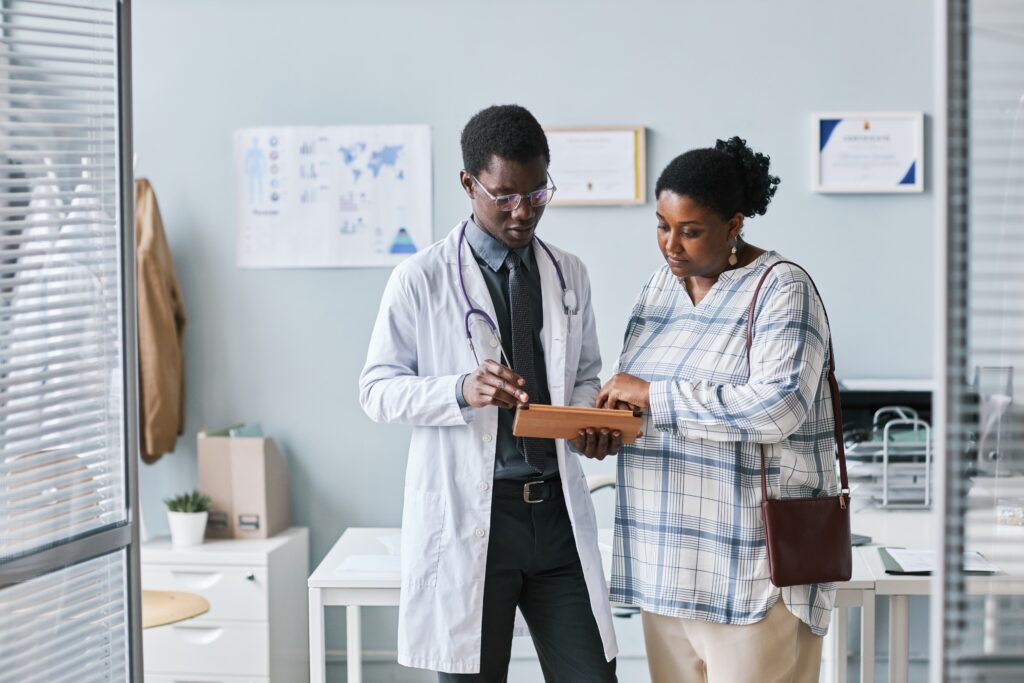 Doctor speaking with patient